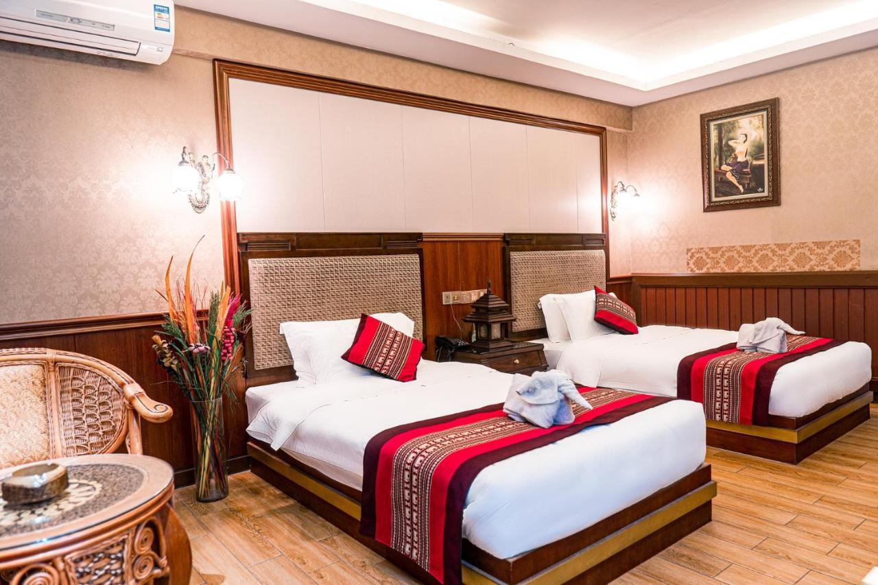 @Siam Hotel Jinghong Buitenkant foto
