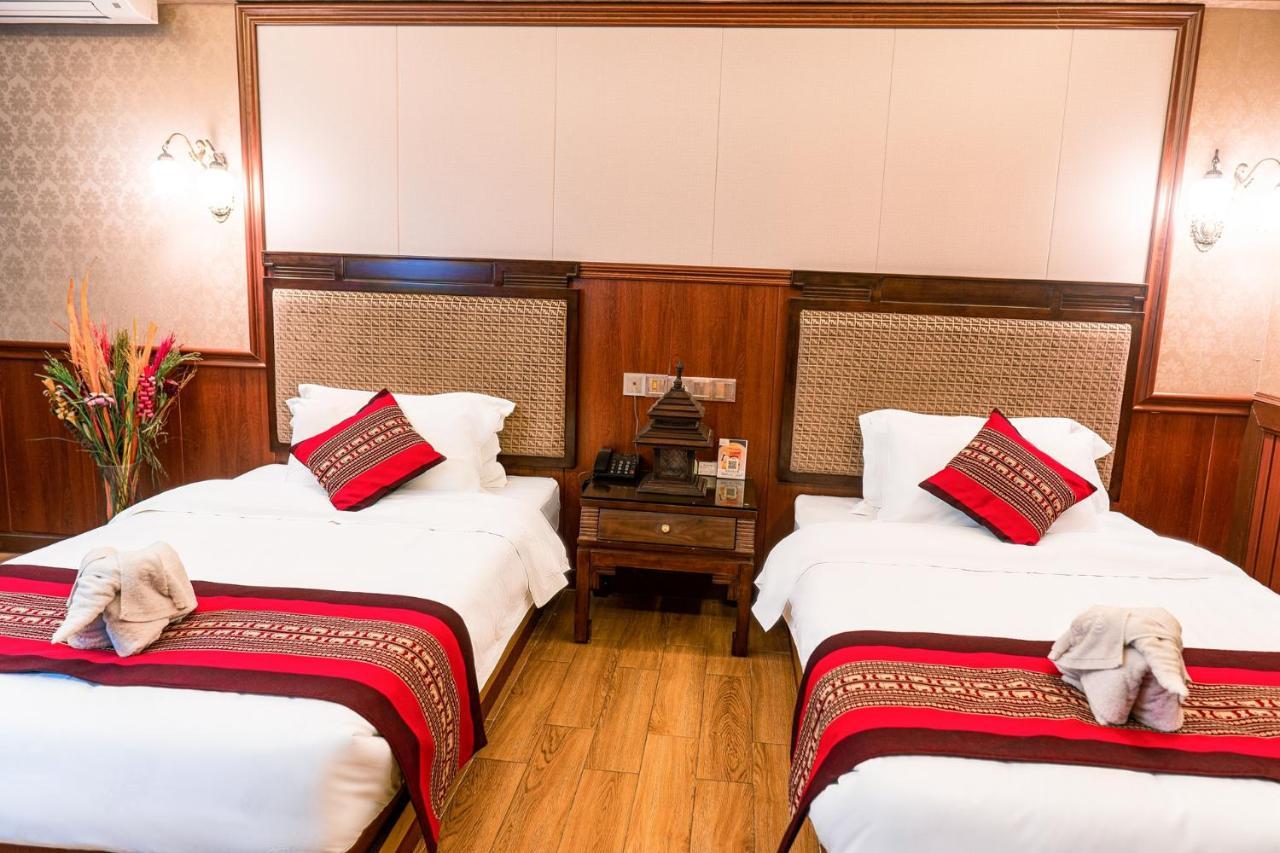@Siam Hotel Jinghong Buitenkant foto