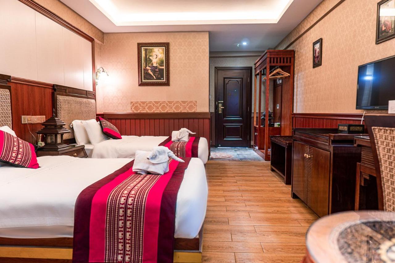 @Siam Hotel Jinghong Buitenkant foto