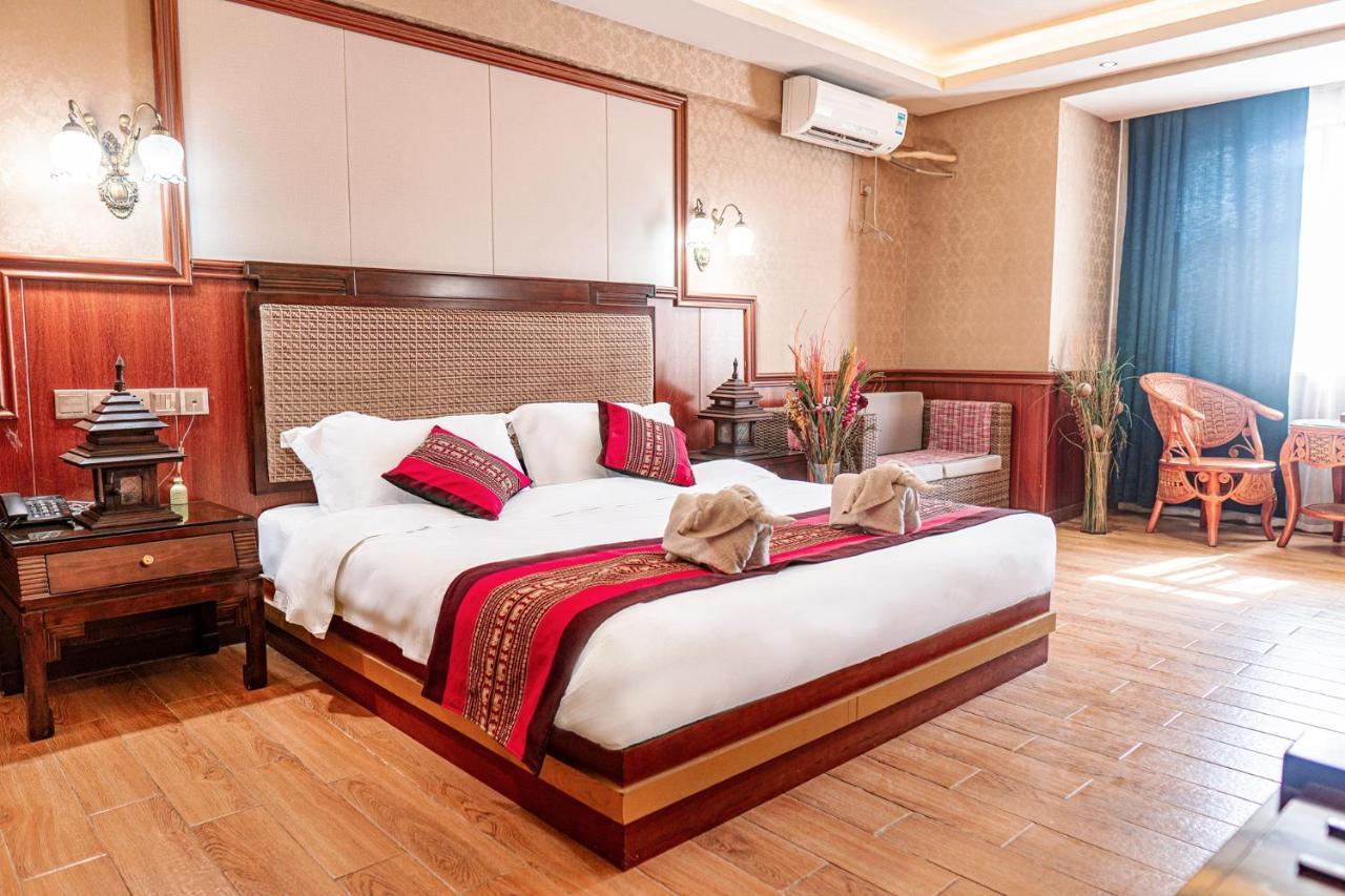 @Siam Hotel Jinghong Buitenkant foto