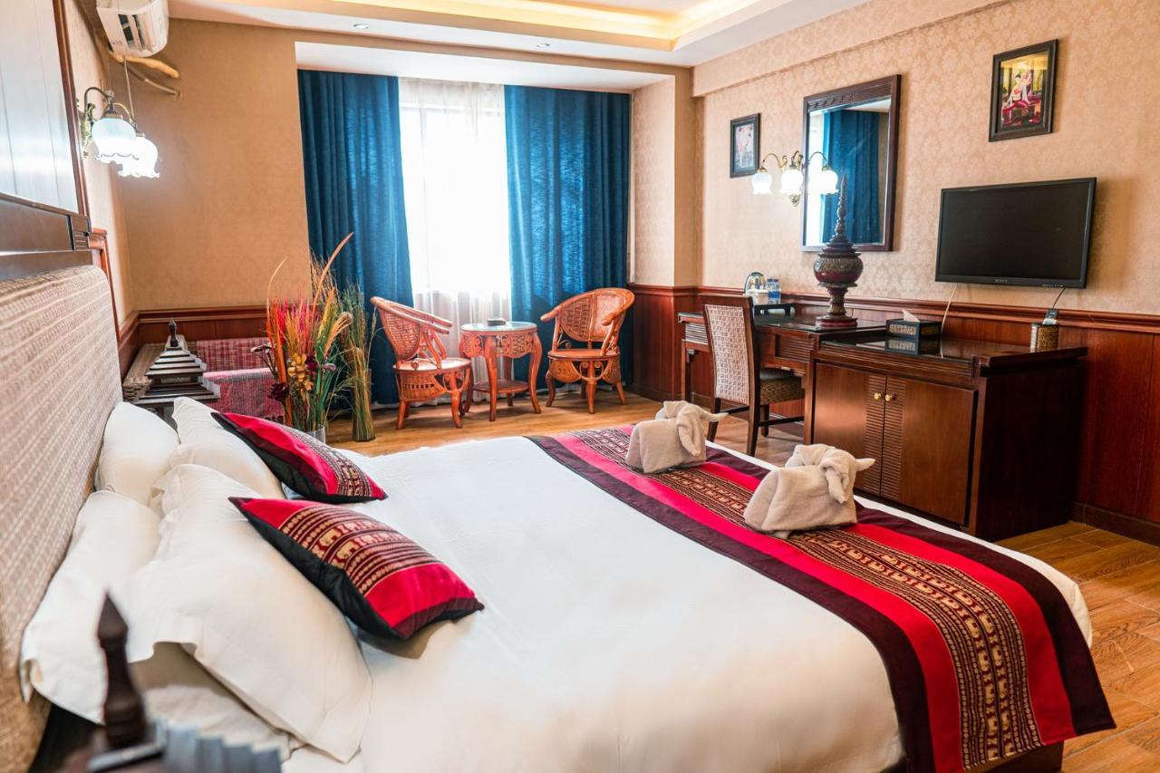 @Siam Hotel Jinghong Buitenkant foto