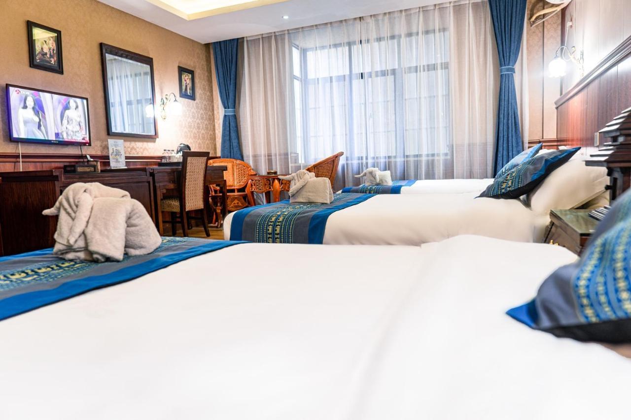 @Siam Hotel Jinghong Buitenkant foto