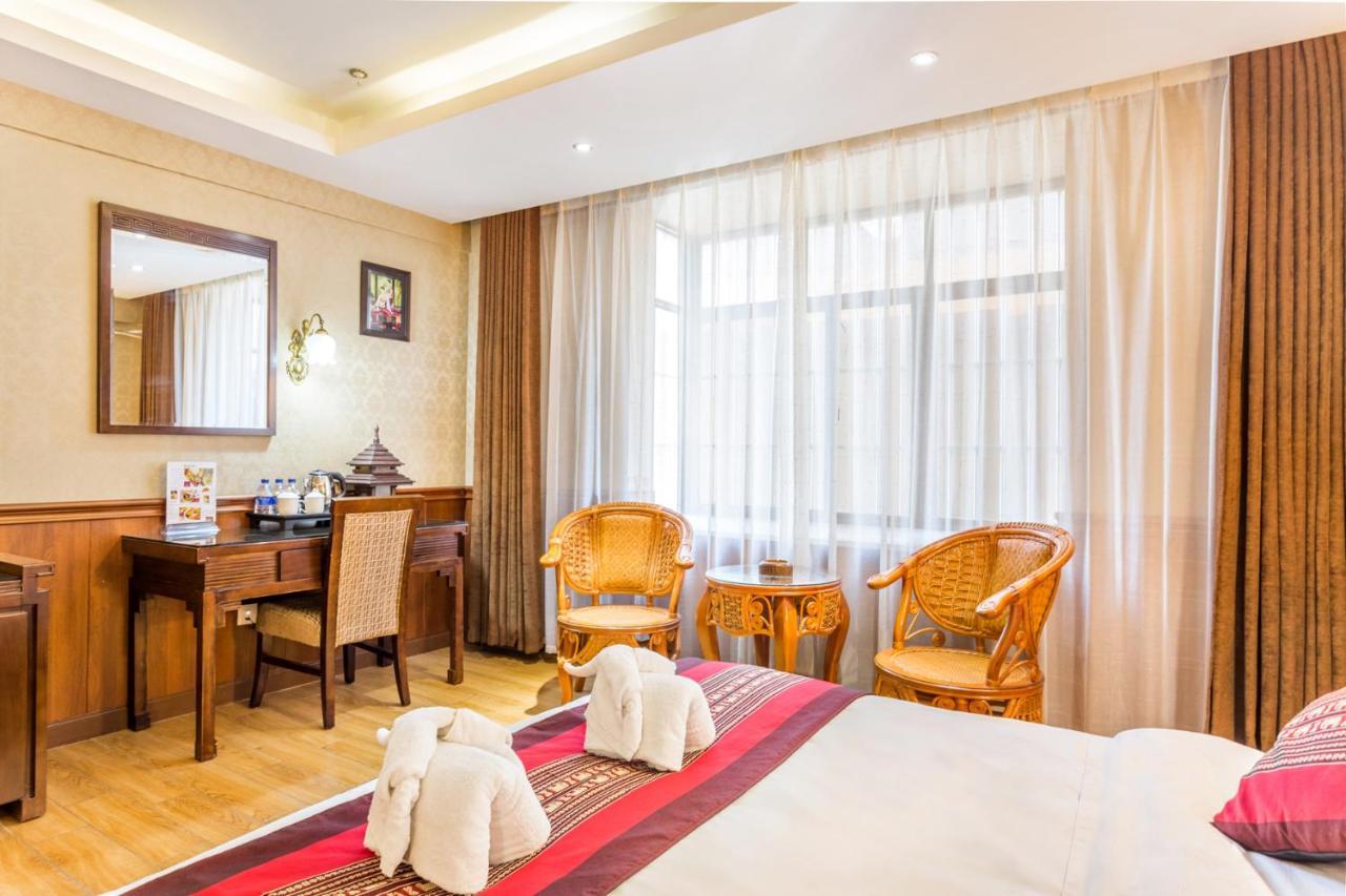 @Siam Hotel Jinghong Buitenkant foto