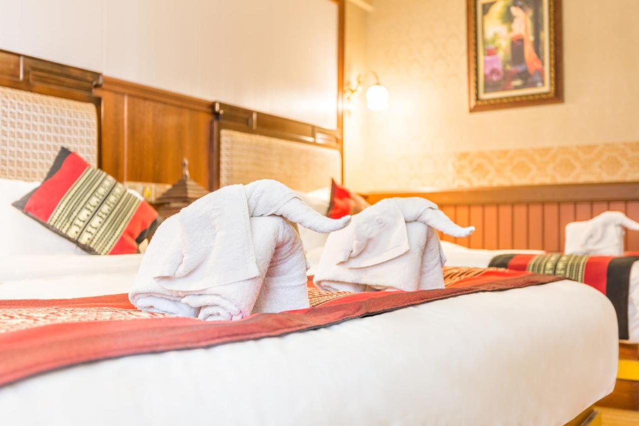 @Siam Hotel Jinghong Buitenkant foto